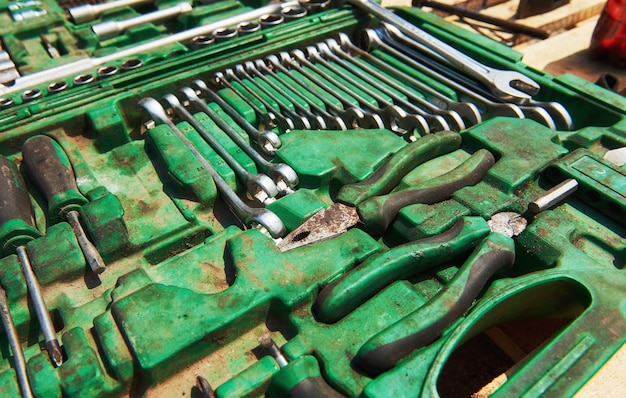 A lot of old instruments in tool box.