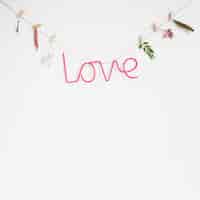 Free photo love concept with clothes line and leaves