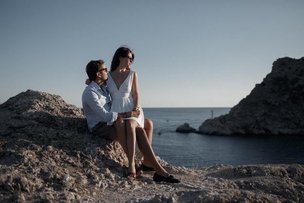 love couple of pretty woman and man in hats outdoor