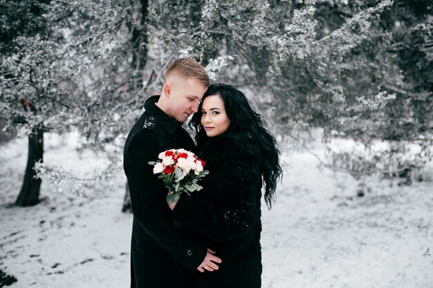 Love couple walk in the  garden