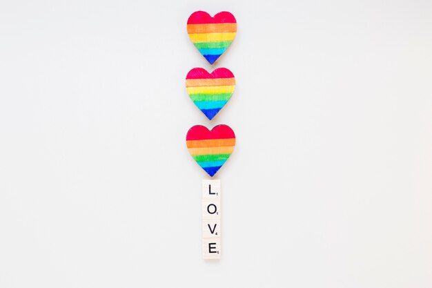 Love inscription with rainbow hearts