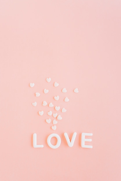 Love inscription with white hearts