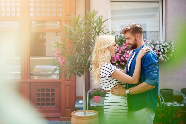 Love is in the air. Couple hugging in the street