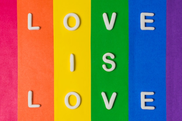 Free photo love is love words and lgbt flag