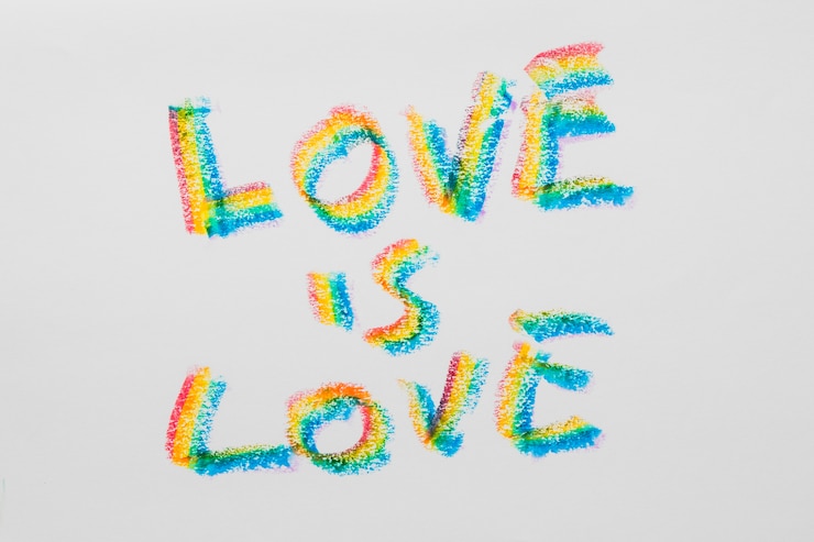 Free Photo love message about love in lgbt colored letters