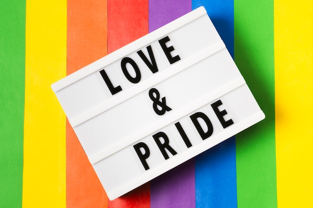 Love and pride concept with rainbow background
