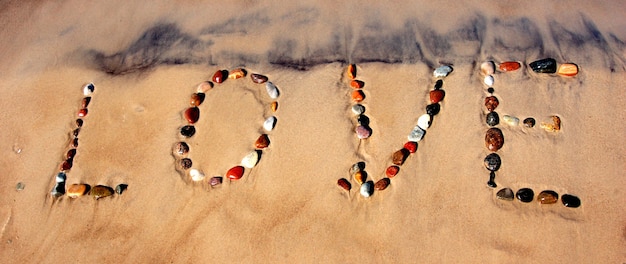 Free photo love on sand
