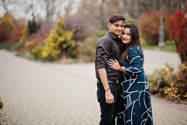 Love story of indian couple posed outdoor