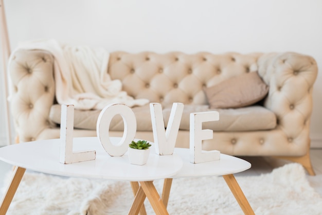 Love title on table in room 