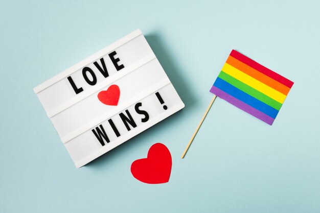 Love wins concept with rainbow colored flag