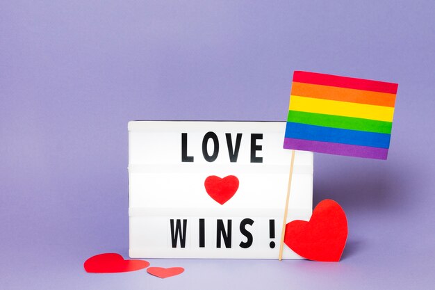 Love wins with rainbow colored flag
