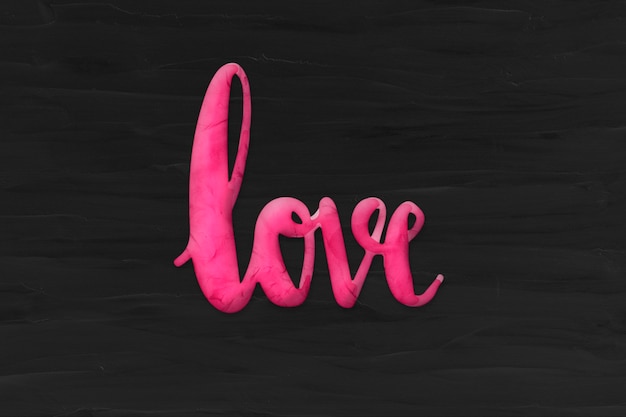 Free photo love word in plasticine clay style