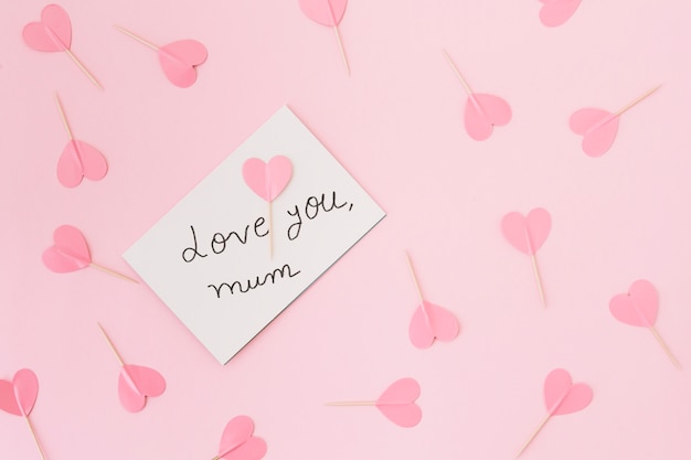 Free photo love you mum inscription with paper hearts
