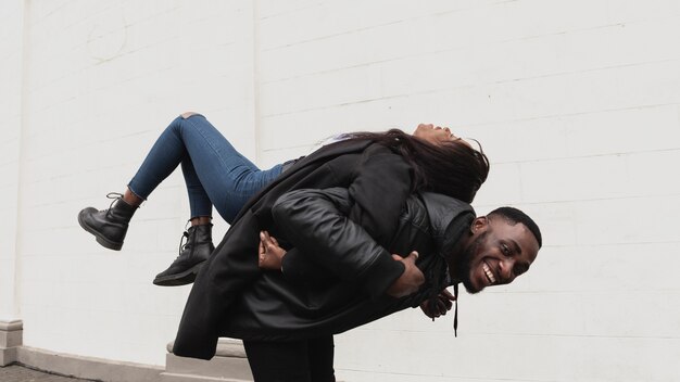 Lovely afroamerican couple being playful