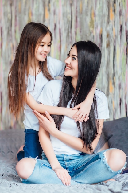 Free photo lovely beautiful mom and daughter , mother's day.