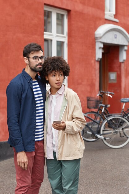 Free photo lovely couple have walk outside