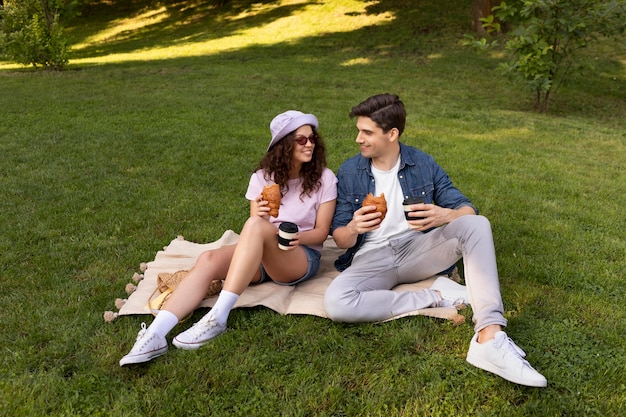 Free photo lovely couple having a date outdoors