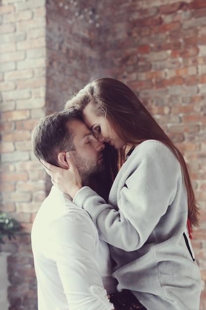 Free photo lovely couple hugging passionately