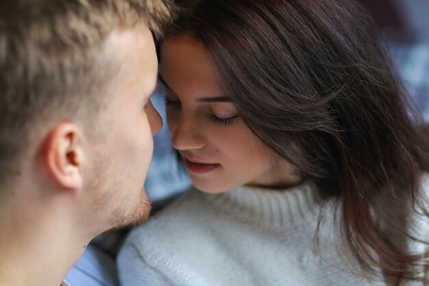 Lovely couple kissing intimately