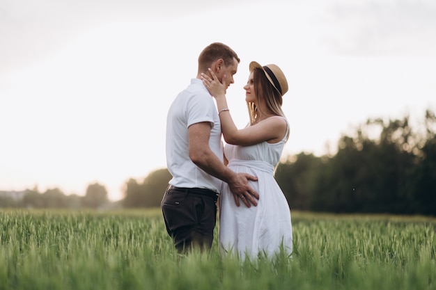 The lovely couple in love looking at each other