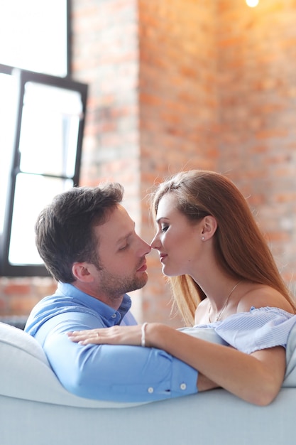 Lovely couple in sofa