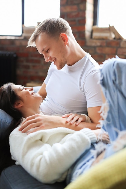 Lovely couple spending time together at home