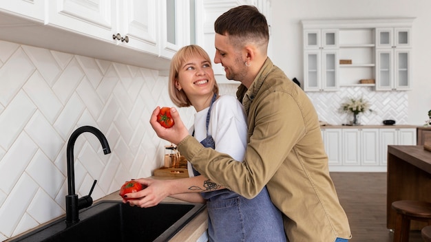 Free photo lovely couple spending time together at home