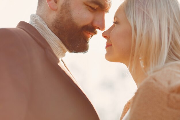 Lovely couple in a spring field