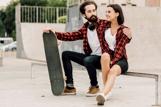 Lovely couple together at skate park