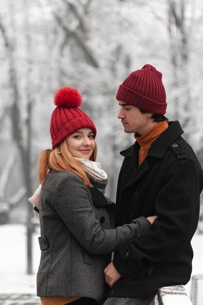 Lovely couple wearing funny red hats