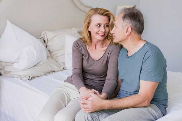 Lovely elderly couple looking at each other