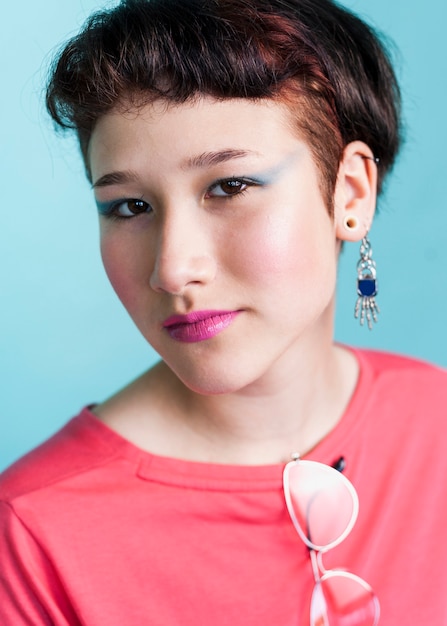 Lovely fashionable lady posing in studio