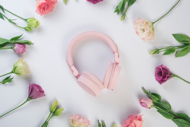 Lovely flowers concept with earphones