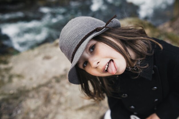 Lovely girl showing tongue