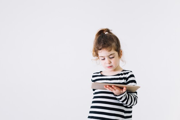 Lovely girl with tablet