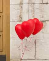 Free photo lovely helium heart balloons