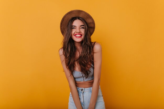 Lovely lady with red lips posing with excited face expression