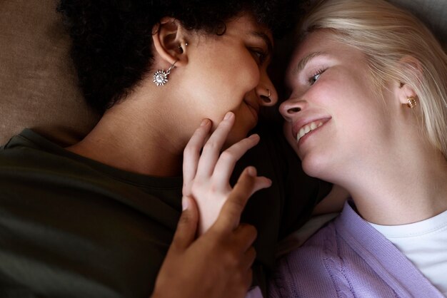 Lovely lesbian couple being affectionate at home