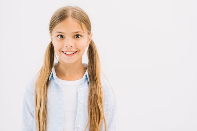 Lovely little girl posing with smiley face