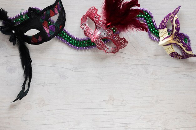 Free photo lovely masks on bead necklaces