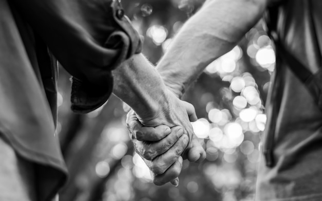 Lovely mature couple holding hands