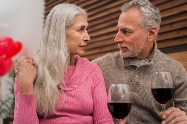 Lovely senior couple looking at each other