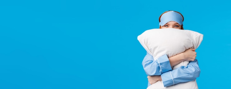 Free Photo lovely and sensual tender cute redhead woman in nightwear teen girl hugging pillow and smiling squin