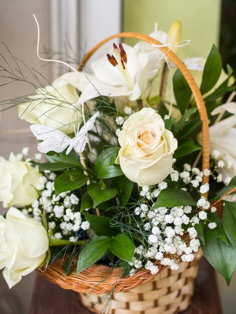 Lovely white roses in a basket