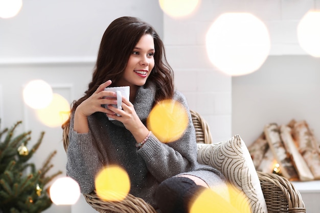 Lovely woman at home at christmas