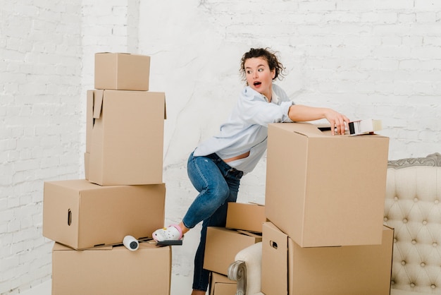 Lovely woman packing things