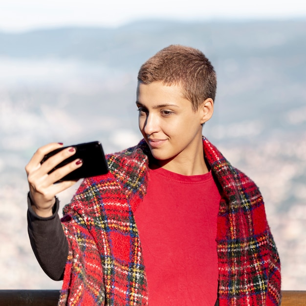 Lovely woman taking a selfie