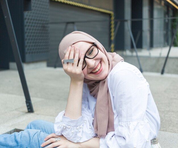 Lovely woman with glasses and hijab