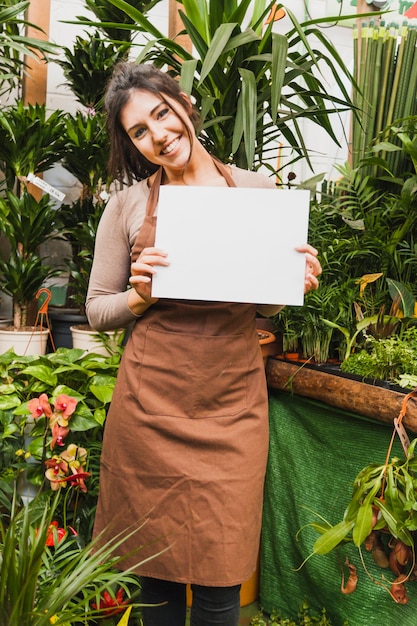 Lovely woman with paper sheet