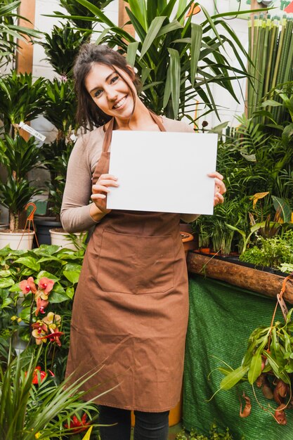 Lovely woman with paper sheet